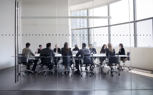Colleagues at business meeting in conference room